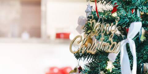 Christmas Tree Decoration with 'Merry Christmas' Sign