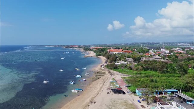 Aerial view of tourists enjoying water rides in Tanjung Benoa, Bali.