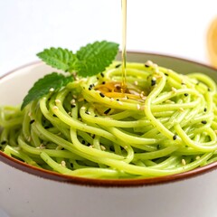 Green pasta with drizzle