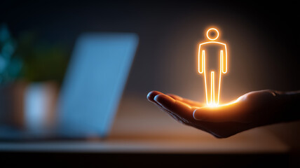 Glowing human figure above a hand embodying customer centric design and personalized support within modern digital work.
