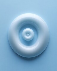 Glossy, light-blue torus with rounded center on blue surface