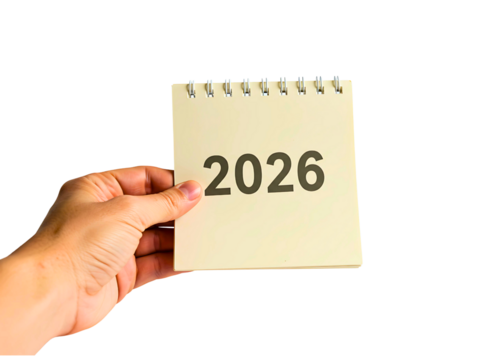 Hand holding a card with the year 2026 isolated on transparent background