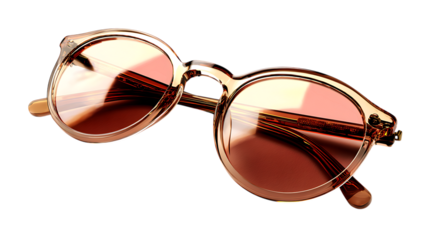 Stylish round sunglasses with rose gold frame isolated on transparent background