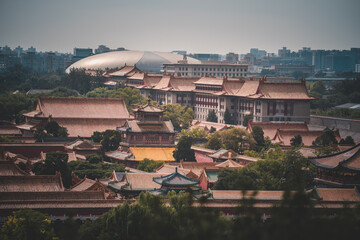 View of The Palace Museum in Beijing, showcasing traditional architecture. Rooftop details,...