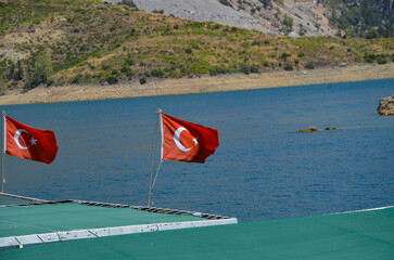 Turkish flag against a blue sky