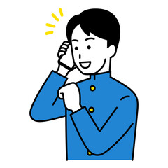 スマートフォンでの通話で喜ぶ男子学生