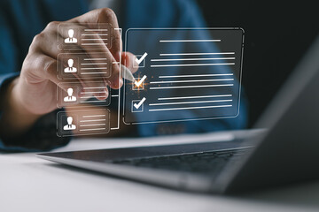 Businessman filling out online employee evaluation form. HR management concept for recruitment, team building in digital workplace and leadership assessment.