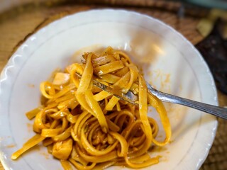 close up of a bowl of spaghetti using egg tofu