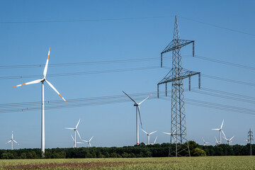 Overhead power lines and wind turbines seen in Germany