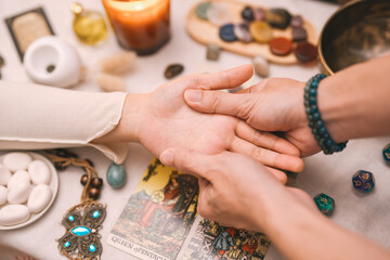 Fortune teller using palmistry reading hand and tarot cards using spiritual divine magic occultism © dodotone