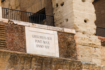 GREGORIUS XVI PONT MAX ANNO XIV (Gregory XVI, Supreme Pontiff, in the 14th year) inscription on plate at the Colosseum in Rome, Italy.