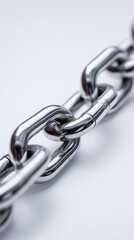Fototapeta premium Close-up of strong metallic chain links on white background. 