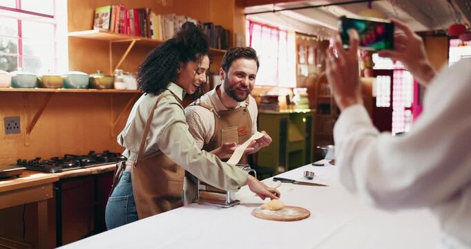 Cooking, class and couple with picture in kitchen for gastronomy, pasta recipe and food memory. Date, people and photo at culinary lesson for italian cuisine, learning experience or social media post