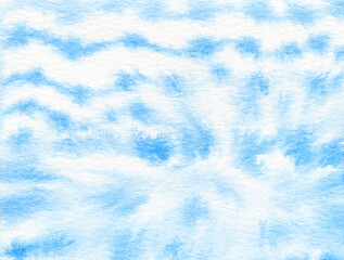 Abstract blue and white tie-dye pattern on textured fabric background, watercolor effect.