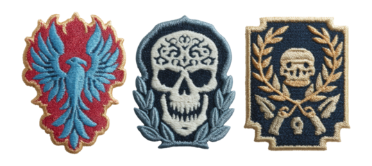 Colorful Embroidered Patches Featuring Skull and Phoenix Designs on Isolated Background