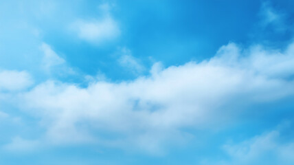 Obraz premium Blue sky background light white clouds large, peaceful, and bright atmosphere, perfect for nature, weather, or relaxation concepts, evoking calm and tranquility