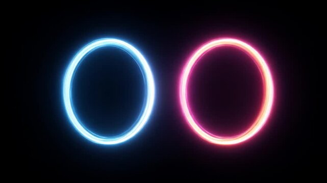 Two glowing rings, one blue and one pink, side by side against a dark background