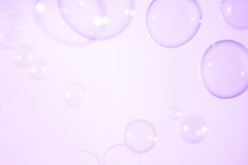 Beautiful Clear Purple Soap Bubbles Floating in The Air. Celebration Festive Backdrop. Freshness Soap Suds Bubbles Water. Purple and White Gradient Textured.	
