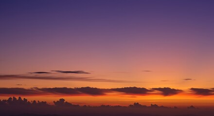 Fototapeta premium Vibrant sunset sky gradient showcasing a powerful color transition from fiery orange to deep purple twilight
