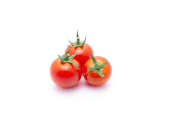 Cherry tomatoes isolated on white background.
