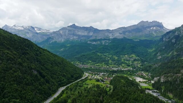 Panoramic drone shot of the Servoz town, summer day in the Alps of France