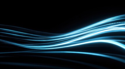 Obraz premium Abstract blue light waves flowing gracefully against a dark backdrop, creating a sense of depth and movement.