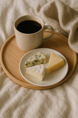 A cup of coffee and Cheese
