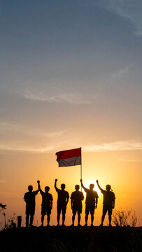 siluet foto pemuda indonesia mengibarkan bendera merah putih