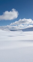 Snowy expanse under a bright sky, distant hills