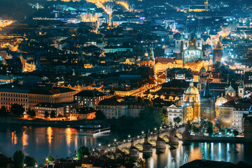 Night panorama of Prague, Czech Republic. Castle, Charles Bridge and Vltava river.