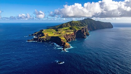 Aerial View of Lush Green Island Surrounded by Deep Blue Ocean Under a Cloudy Sky in a Tropical Setting