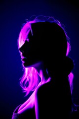Radiant Silhouette: A striking silhouette of a woman, bathed in a mesmerizing interplay of vibrant pink and blue hues, embodying an aura of mystery and allure.
