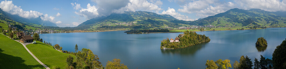 The Schwanau Isle with ruins of a medieval castle on the Lauerzer Lake in Canton Schwyz.