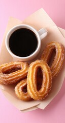 Coffee, churros, beige paper on pink. Sweet treat delight