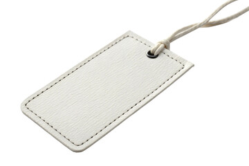 Fototapeta premium White sewn leather tag with isolated yarn thread on white background