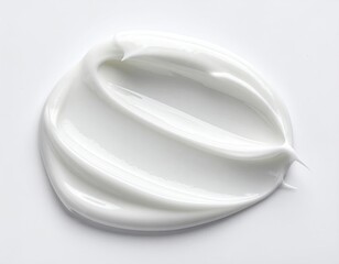 A close-up shot of a swirl of smooth, white cream on a bright white background