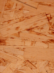 Close up of oriented strand board texture with natural wooden pattern