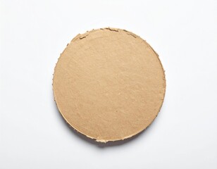 Overhead shot of a single, circular piece of corrugated cardboard on white