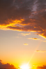 Dramatic Sunset Sky with Golden Clouds
