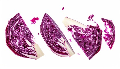 Vibrant overhead shot of sliced red cabbage pieces against a stark white backdrop