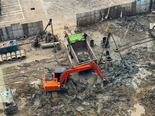 An excavator working on a new construction site 