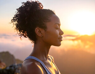 Diverse women practicing meditation or yoga on a mountaintop at sunrise, with the bright sun and clouds below, conveying wellness, mindfulness, and tranquility in nature.