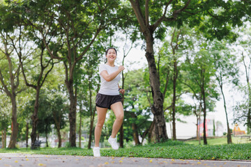 Smiling woman exercising outdoors, embracing healthy lifestyle