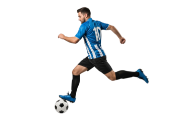 Soccer player in blue jersey kicking a soccer ball isolated on transparent background