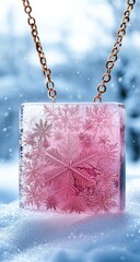 Icy pendant. Pink snowflake encased in a translucent square