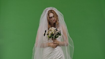 Dead Bride in a Wedding Dress on a Green Background