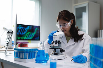 Female scientist researching dna analysis in laboratory