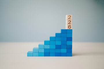 Wooden blocks stacked in a staircase formation with numbers 226 on the top block cube cubes