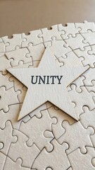 Star with Unity Word on Puzzle Background Symbolizing Togetherness