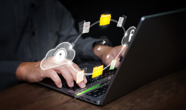 Hands using laptop with secure cloud file transfer illustration, representing encrypted data synchronization, safe online storage, and modern digital communication.